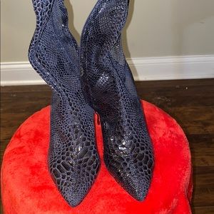 Thigh high faux snake skin boots